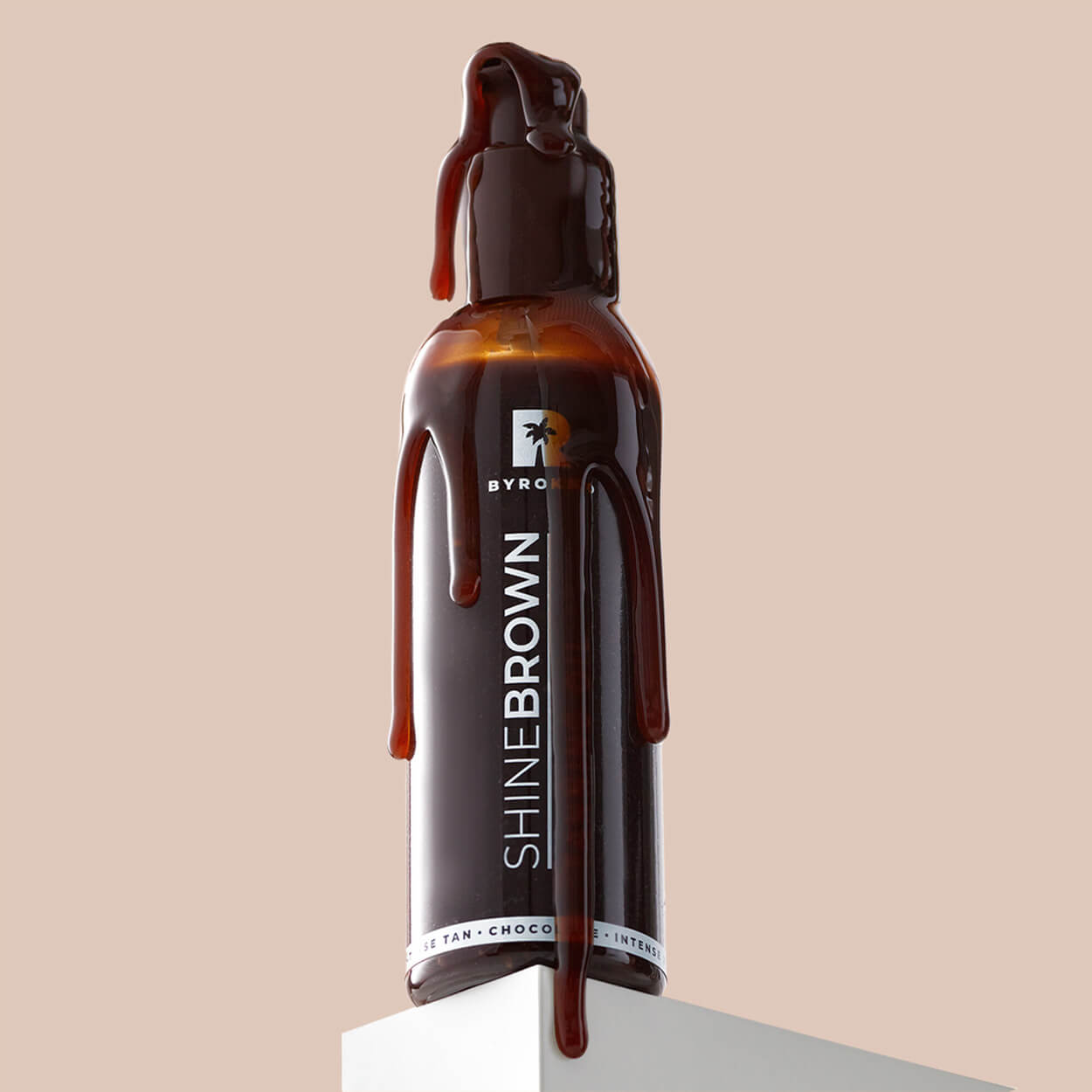 An open package of a Shine brown chocolate tan body oil.